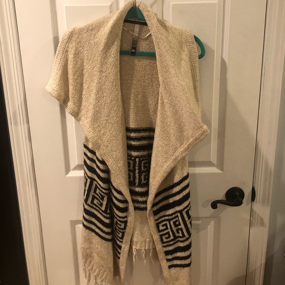 Long Sweater with no sleeves